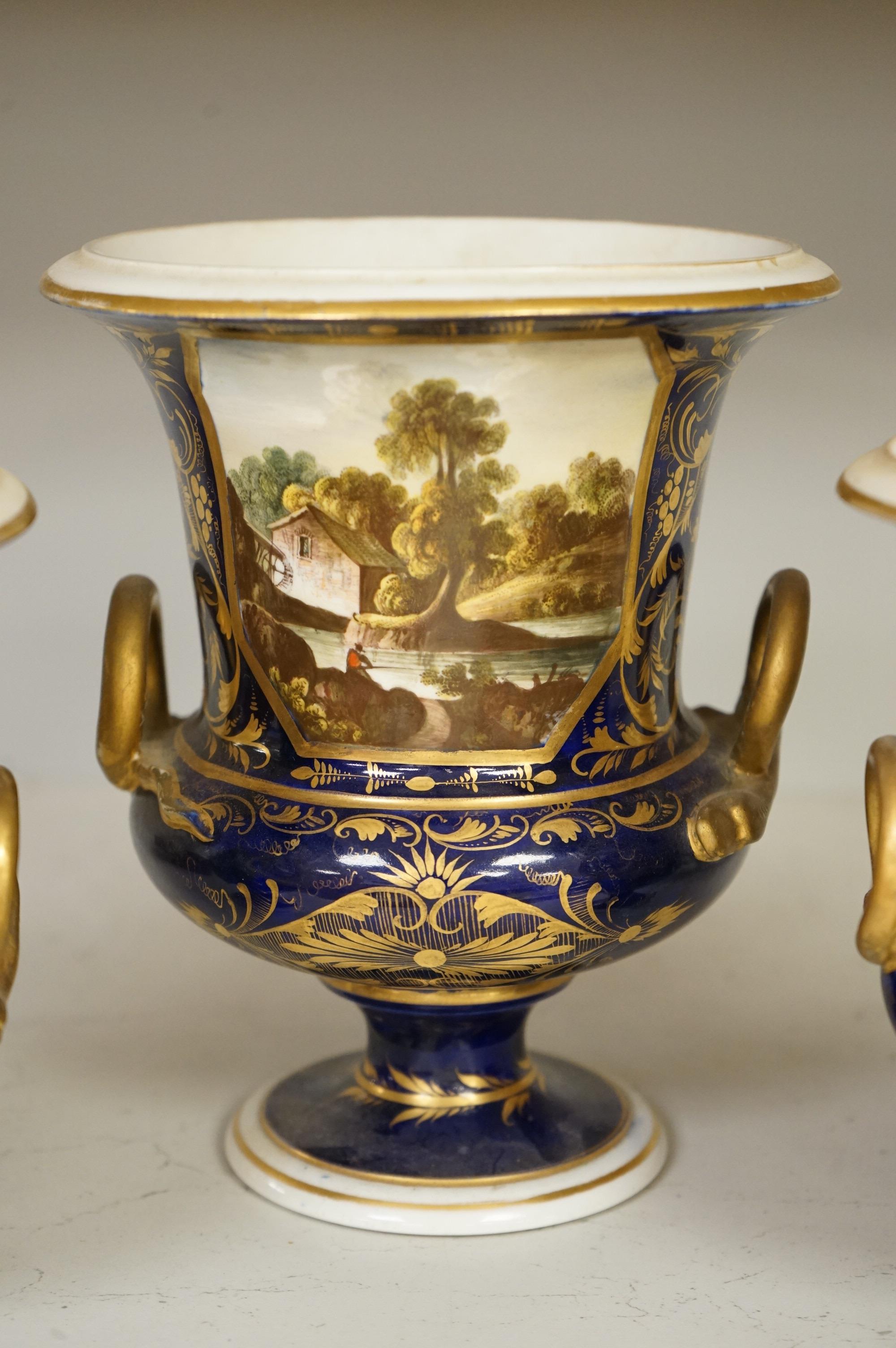 A set of three Derby campana vases, painted with named views, circa 1820, tallest 20.5cm